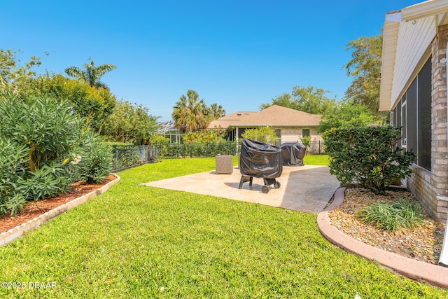 view of yard with a fenced backyard and a patio area