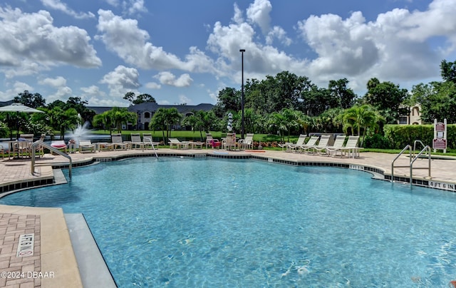 940 Village Trl Unit 6-305, Port Orange, FL 32127 - community pool with a patio area