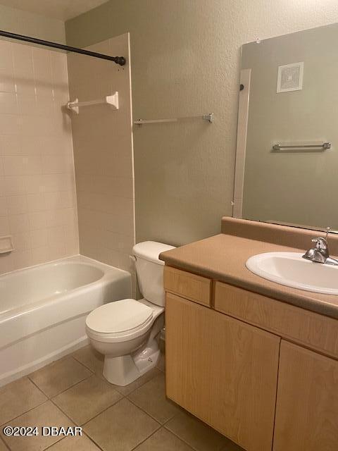 940 Village Trl Unit 6-305, Port Orange, FL 32127 - bathroom featuring vanity, tub / shower combination, and tile patterned flooring
