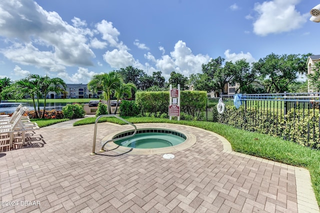 940 Village Trl Unit 6-305, Port Orange, FL 32127 - view of swimming pool with a hot tub