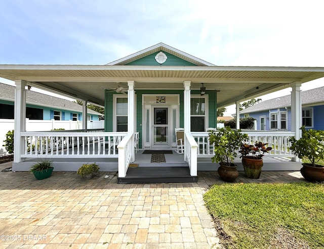 415 Jessamine Ave, New Smyrna Beach, FL 32169 - doorway to property with a porch and a ceiling fan