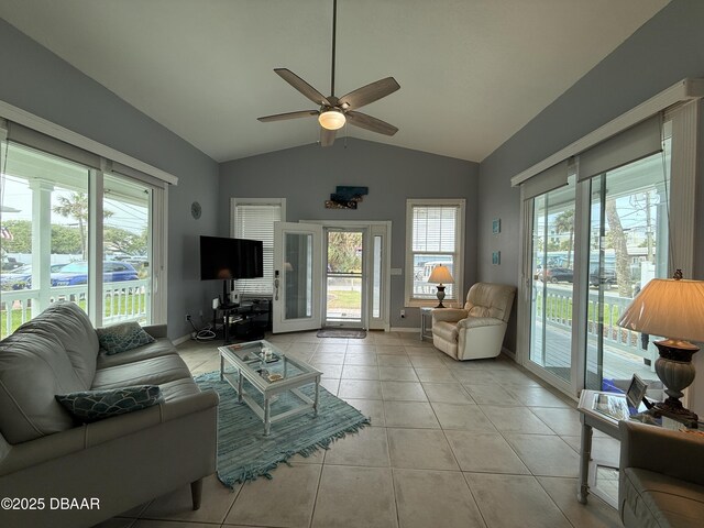 415 Jessamine Ave, New Smyrna Beach, FL 32169 - living room with plenty of natural light, ceiling fan, lofted ceiling, and light tile patterned floors