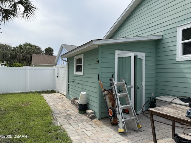 415 Jessamine Ave, New Smyrna Beach, FL 32169 - view of patio with a gate