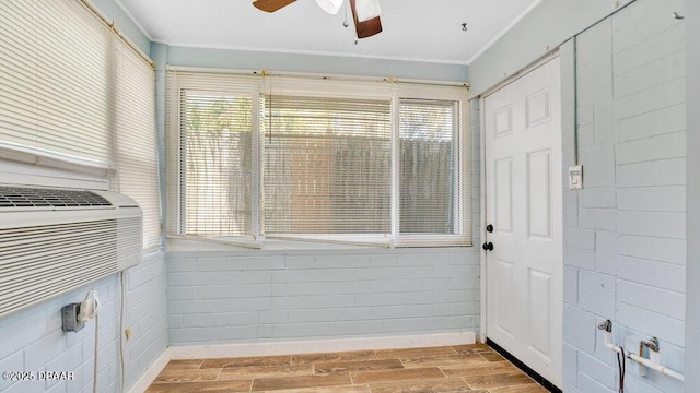 interior space featuring ceiling fan