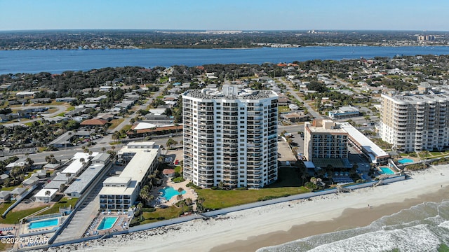 drone / aerial view with a view of the beach and a water view