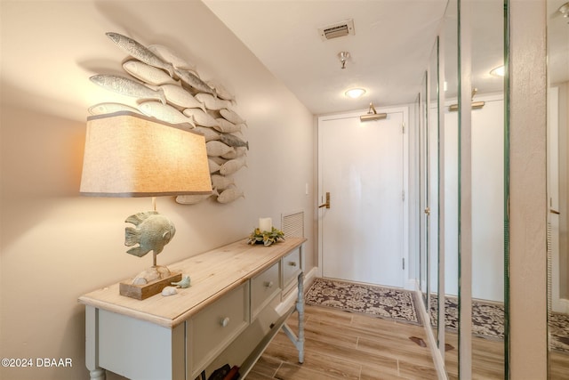 doorway with light hardwood / wood-style floors