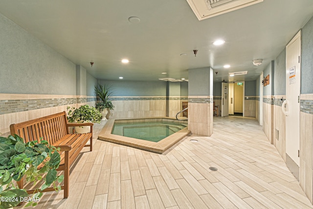 view of pool featuring an indoor in ground hot tub