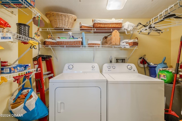 laundry room with independent washer and dryer