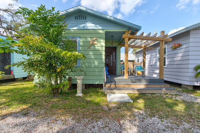 view of front of house with a wooden deck