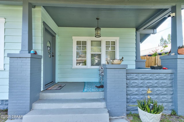 doorway to property featuring a porch