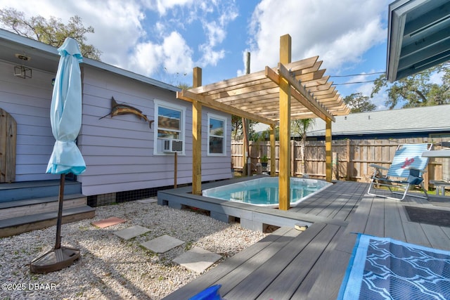 wooden terrace with a fenced in pool, cooling unit, and a pergola