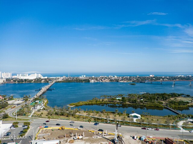 drone / aerial view with a water view