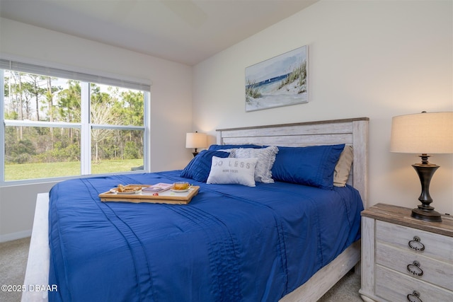 bedroom featuring carpet, ceiling fan, and baseboards