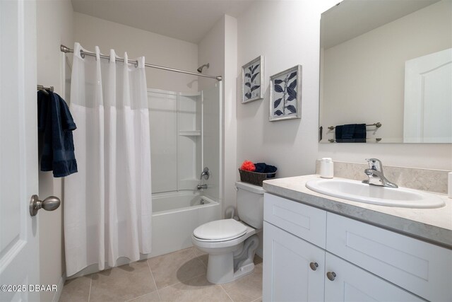 bathroom with shower / bath combination with curtain, tile patterned flooring, vanity, and toilet