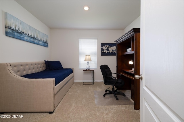 carpeted bedroom with baseboards