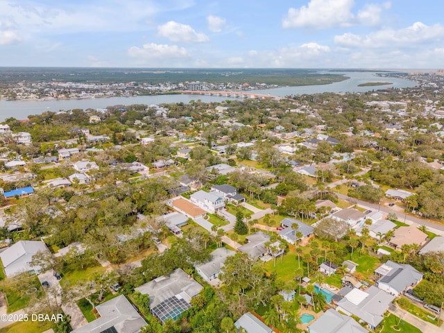 birds eye view of property featuring a residential view and a water view
