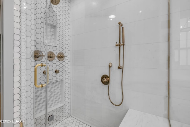 full bath featuring tiled shower