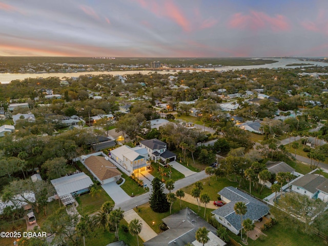 bird's eye view with a water view and a residential view