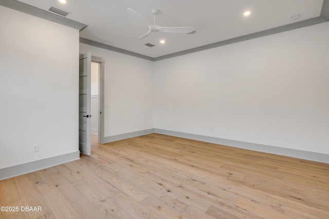 spare room featuring visible vents, light wood-style floors, recessed lighting, and a ceiling fan