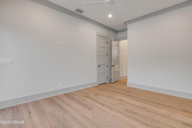 spare room featuring recessed lighting, baseboards, light wood finished floors, ceiling fan, and visible vents