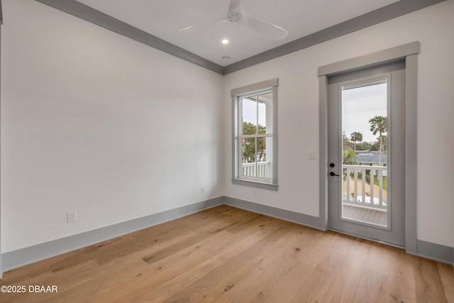 spare room with baseboards, light wood-type flooring, recessed lighting, and a ceiling fan