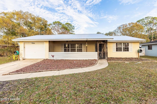 ranch-style house with a garage and a front yard