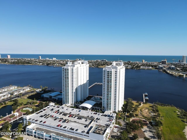 birds eye view of property featuring a water view