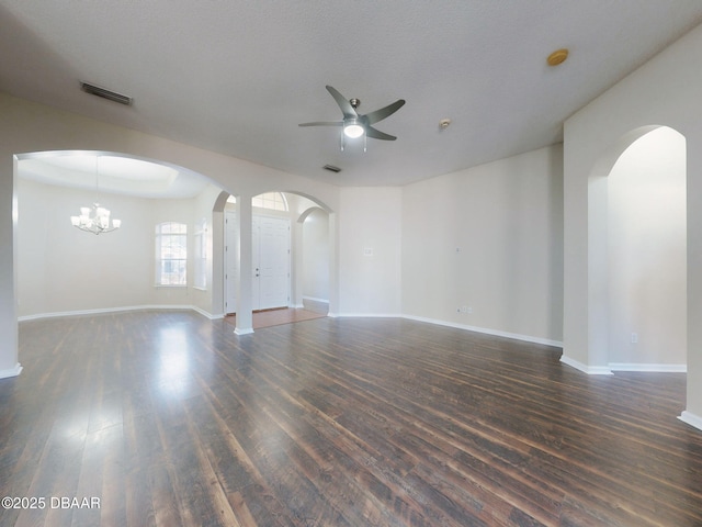 unfurnished bedroom with dark wood-type flooring, a closet, and multiple windows