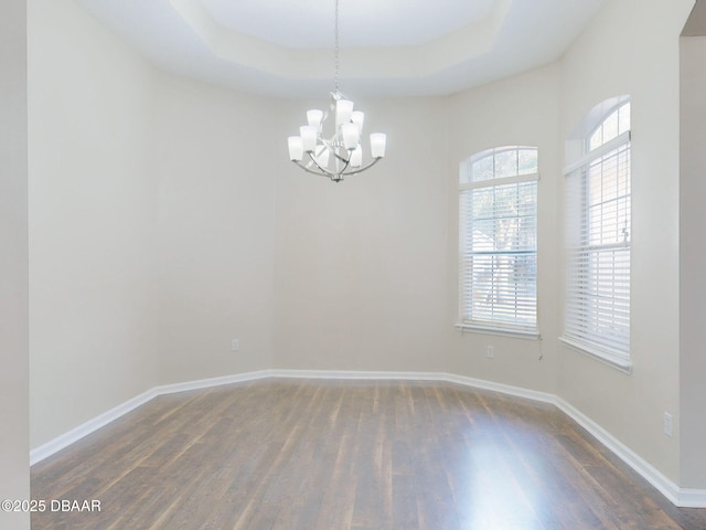 unfurnished sunroom featuring ceiling fan