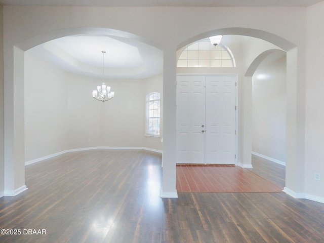 unfurnished room featuring ceiling fan and dark hardwood / wood-style floors