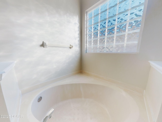 bathroom featuring a tub