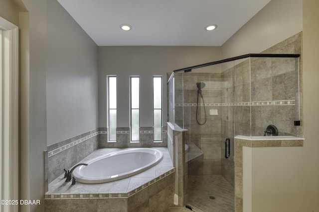2809 Oakgrove Ave, Saint Augustine, FL 32092 - bathroom featuring a garden tub, a shower stall, and recessed lighting