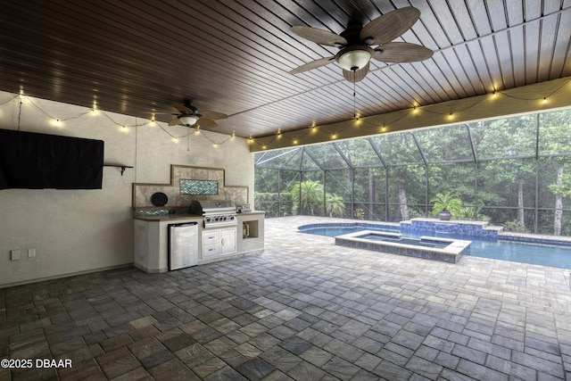 2809 Oakgrove Ave, Saint Augustine, FL 32092 - view of patio with an outdoor kitchen, a ceiling fan, a lanai, and a pool with connected hot tub