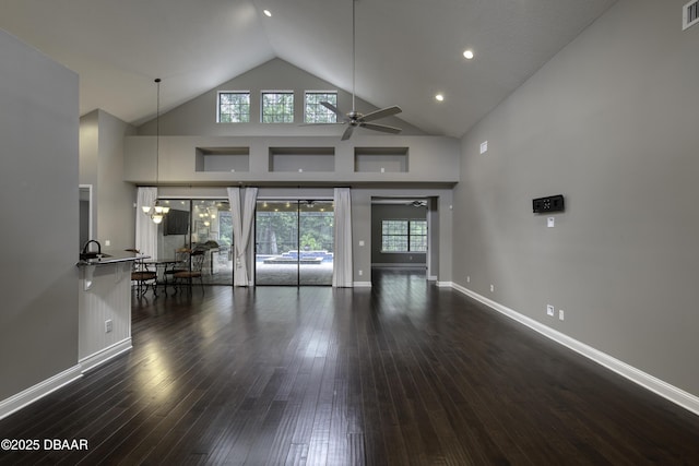 2809 Oakgrove Ave, Saint Augustine, FL 32092 - living room featuring a ceiling fan, dark wood finished floors, high vaulted ceiling, and recessed lighting