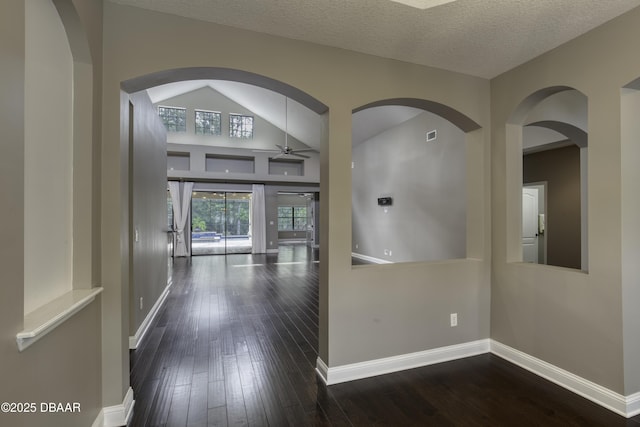2809 Oakgrove Ave, Saint Augustine, FL 32092 - corridor featuring dark wood-style flooring and a textured ceiling