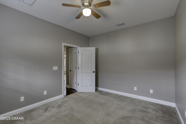 2809 Oakgrove Ave, Saint Augustine, FL 32092 - empty room featuring ceiling fan, carpet flooring, and a textured ceiling