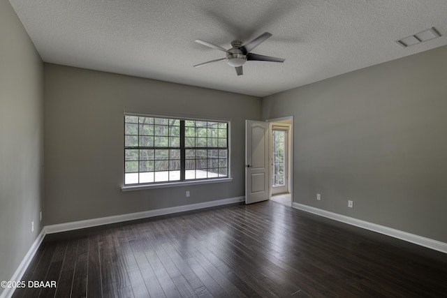 2809 Oakgrove Ave, Saint Augustine, FL 32092 - empty room featuring ceiling fan, dark wood-style flooring, and a textured ceiling
