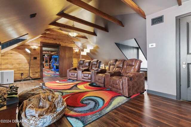 living room featuring lofted ceiling with beams, wooden walls, and dark hardwood / wood-style floors