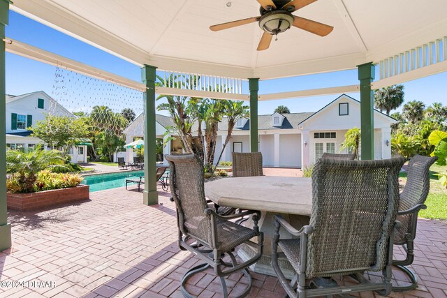 view of patio featuring ceiling fan