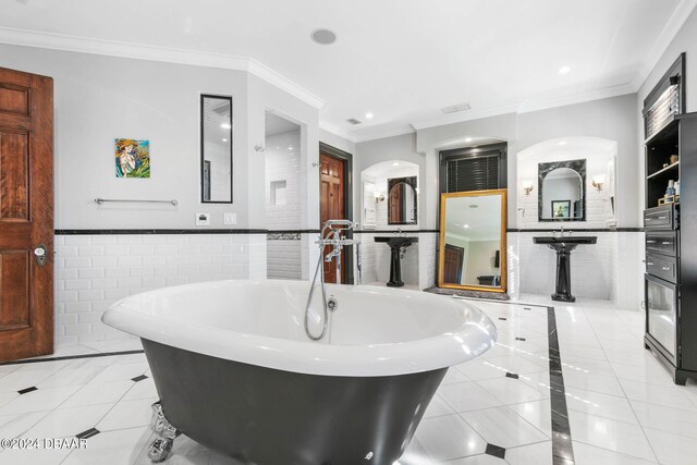 bathroom with tile walls, tile patterned floors, and crown molding