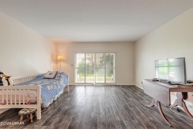 bedroom featuring dark hardwood / wood-style flooring