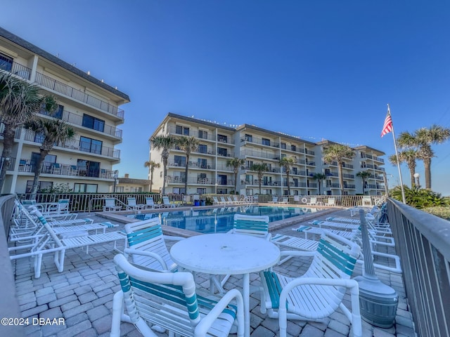 2700 Ocean Shore Blvd Unit 313, Ormond Beach, FL 32176 - view of patio / terrace with a community pool