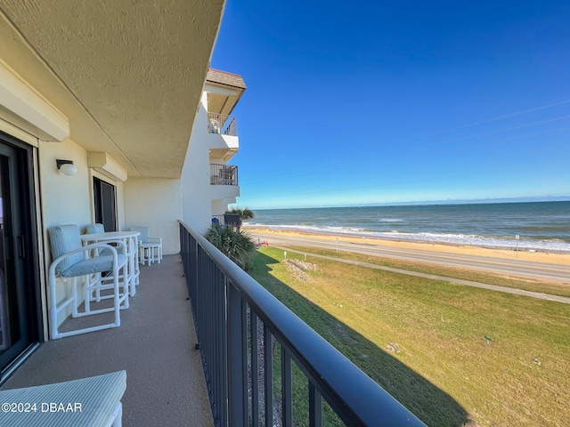 2700 Ocean Shore Blvd Unit 313, Ormond Beach, FL 32176 - balcony with view of water and beach