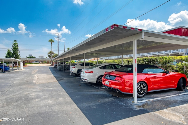 view of vehicle parking featuring a carport