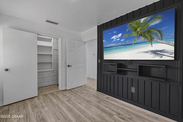 1214 Flomich St, Daytona Beach, FL 32117 - unfurnished bedroom featuring wood finished floors