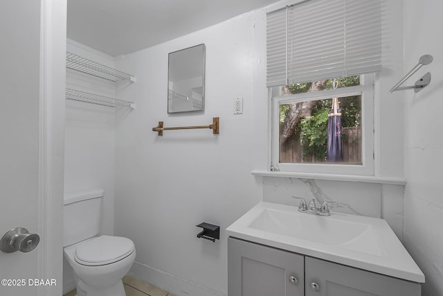 1214 Flomich St, Daytona Beach, FL 32117 - half bath featuring vanity and toilet