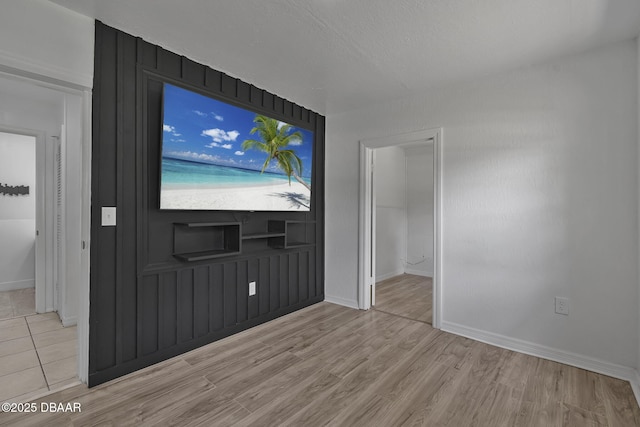 1214 Flomich St, Daytona Beach, FL 32117 - unfurnished bedroom featuring wood finished floors and baseboards