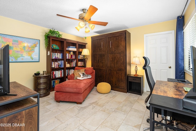 home office with a ceiling fan