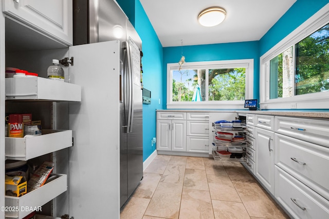 laundry area with a healthy amount of sunlight