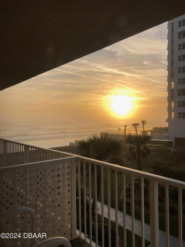 balcony at dusk with a water view